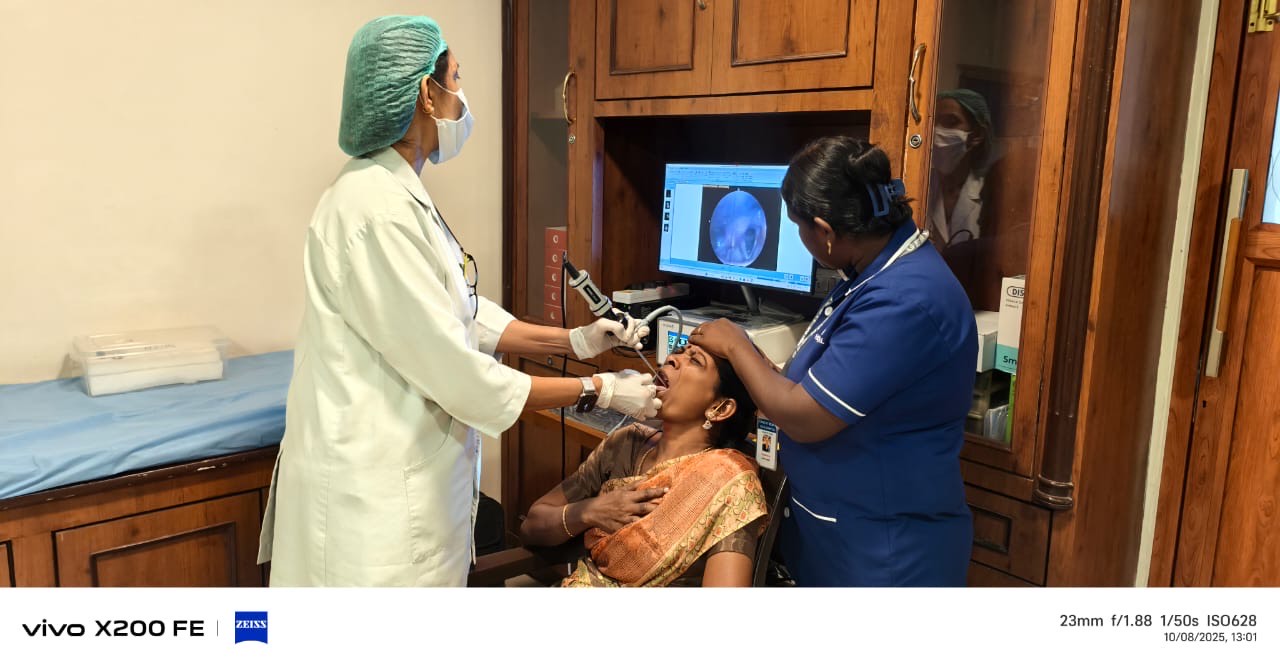 ENT specialist performing an endoscopic throat examination at GEM Hospital, Tirunelveli.